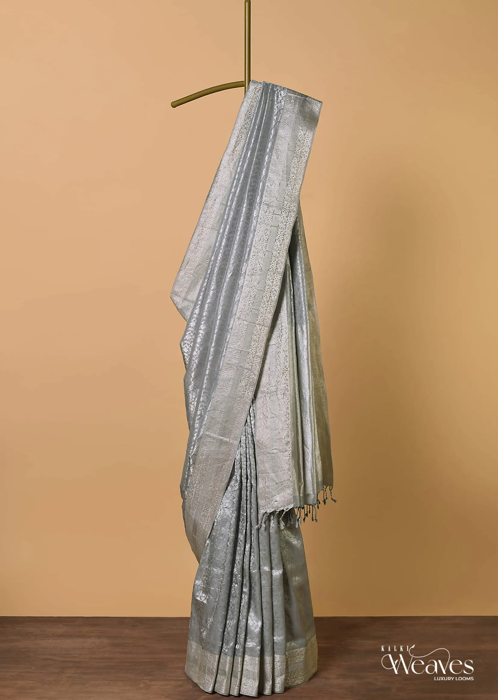 Grey South Silk Saree With Abstract Zari Border And Unstitched Blouse Fabric
