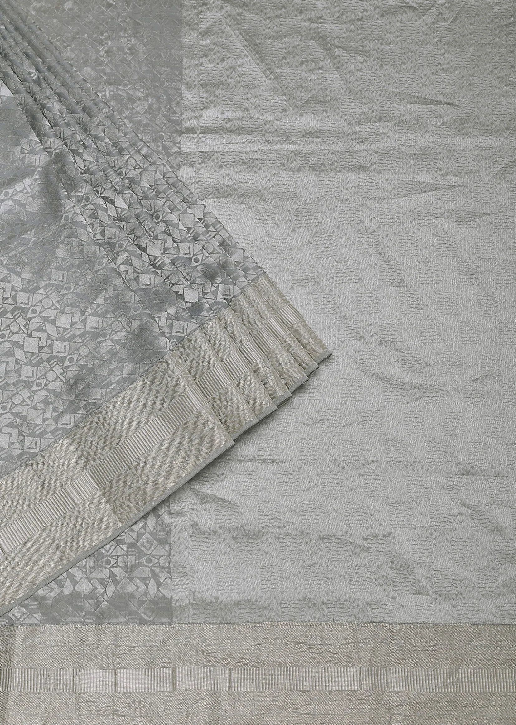 Grey South Silk Saree With Abstract Zari Border And Unstitched Blouse Fabric