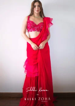 Hot Pink Crop Top Sharara Suit With An Attached Ruffle Draped And An Hand Embroidered Leaf Motifs