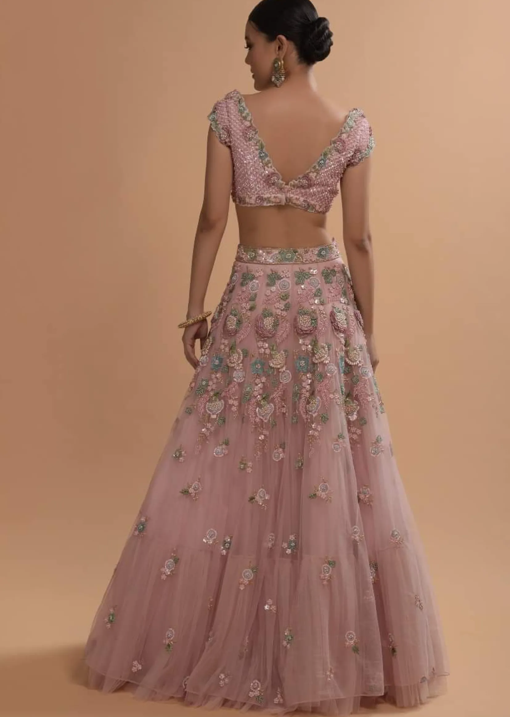 Icy Pink Net Lehenga And Cap Sleeves Crop Top With 3D Flower Cluster And Scattered Buttis