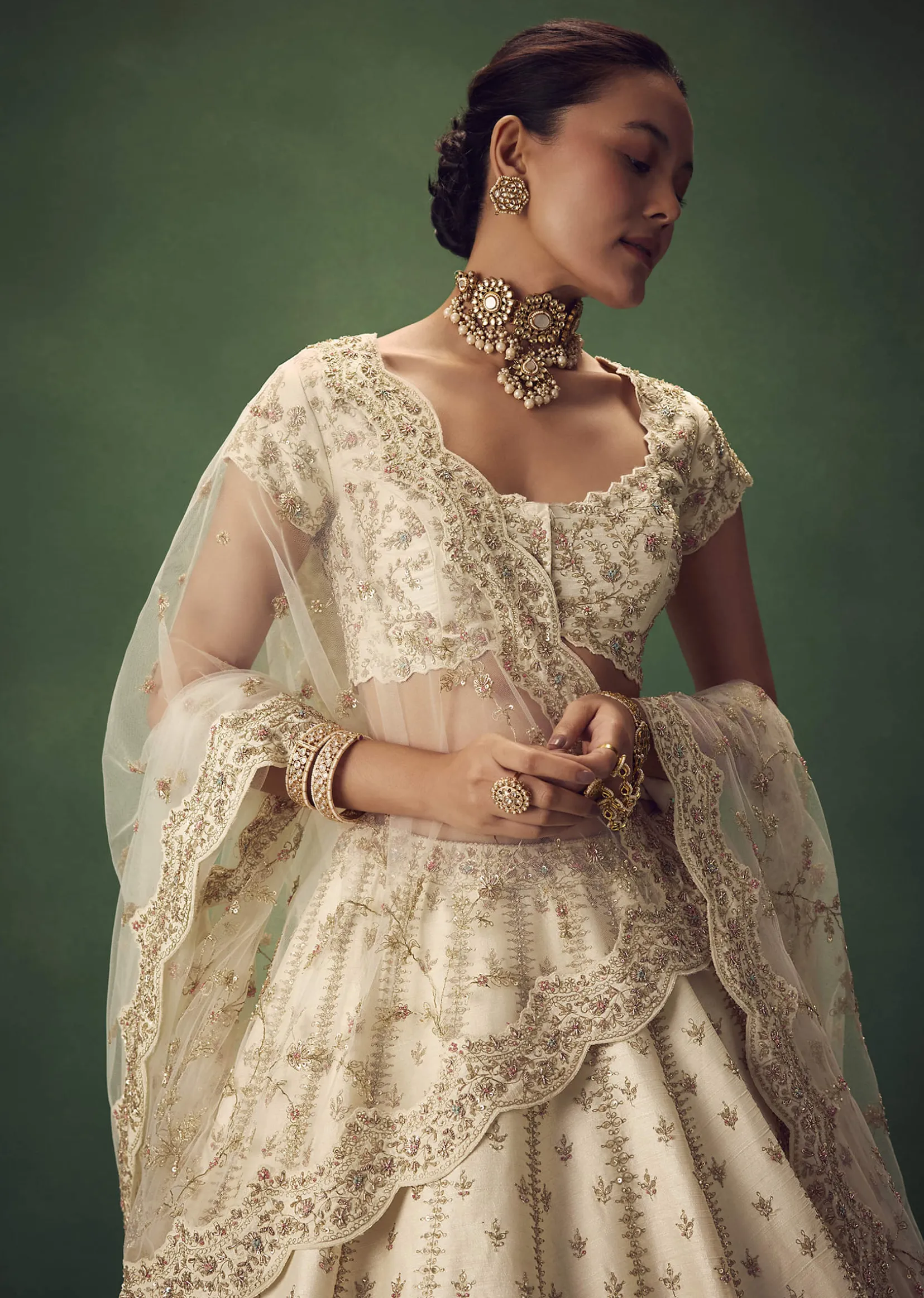 Ivory Lehenga Set With Hand Embroidered Thread And Zari Work