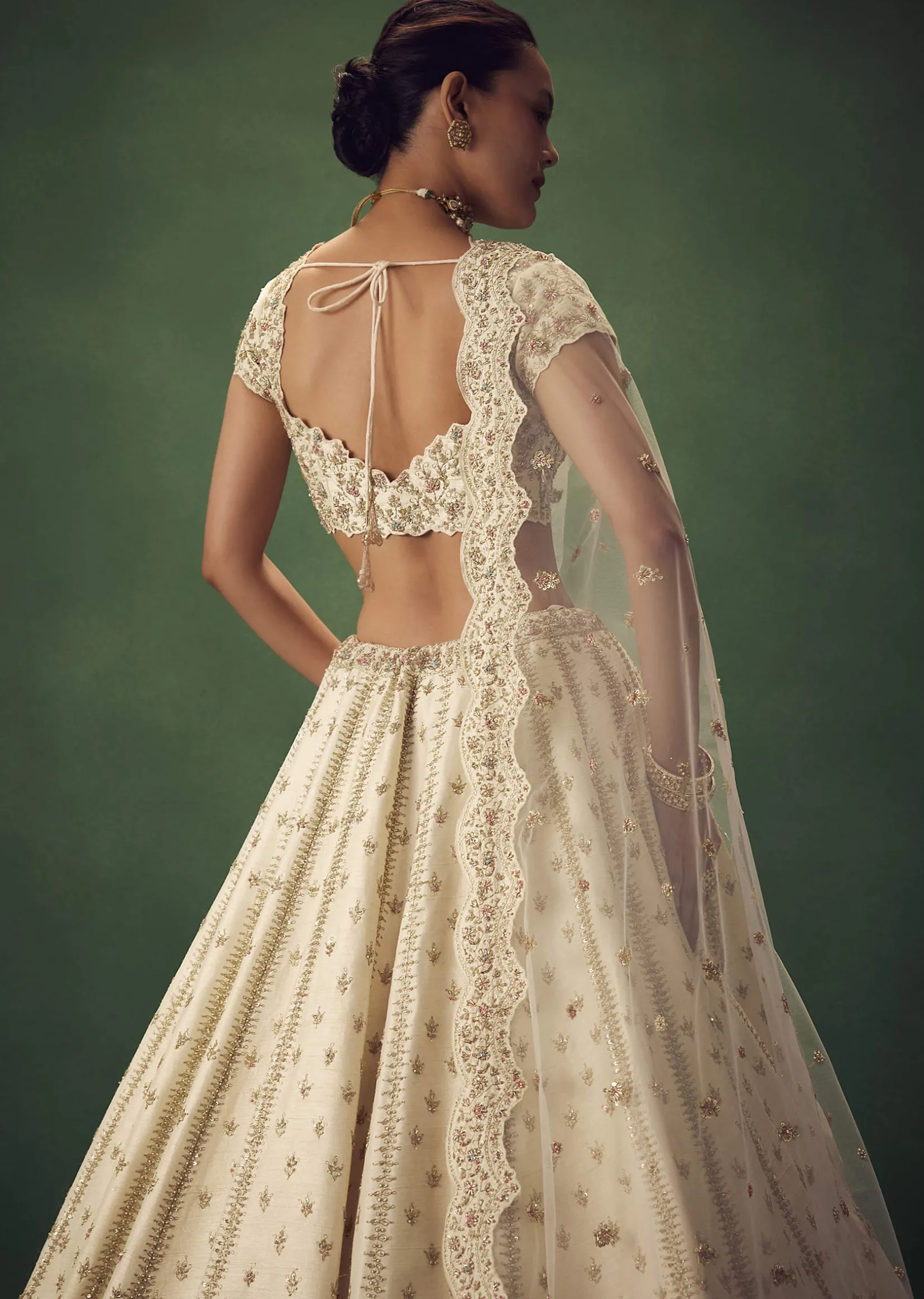 Ivory Lehenga Set With Hand Embroidered Thread And Zari Work