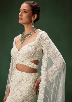 Ivory Mermaid Bridal Lehenga With Full Sleeves And Heavy Embroidery