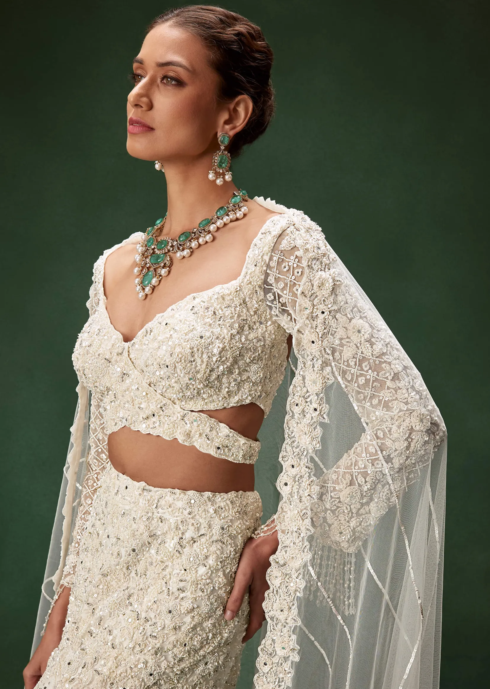 Ivory Mermaid Bridal Lehenga With Full Sleeves And Heavy Embroidery