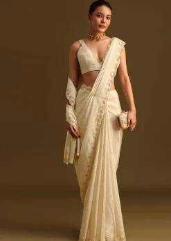 Ivory Tissue Saree With Cutdana Embroidered Border and Unstitched Blouse