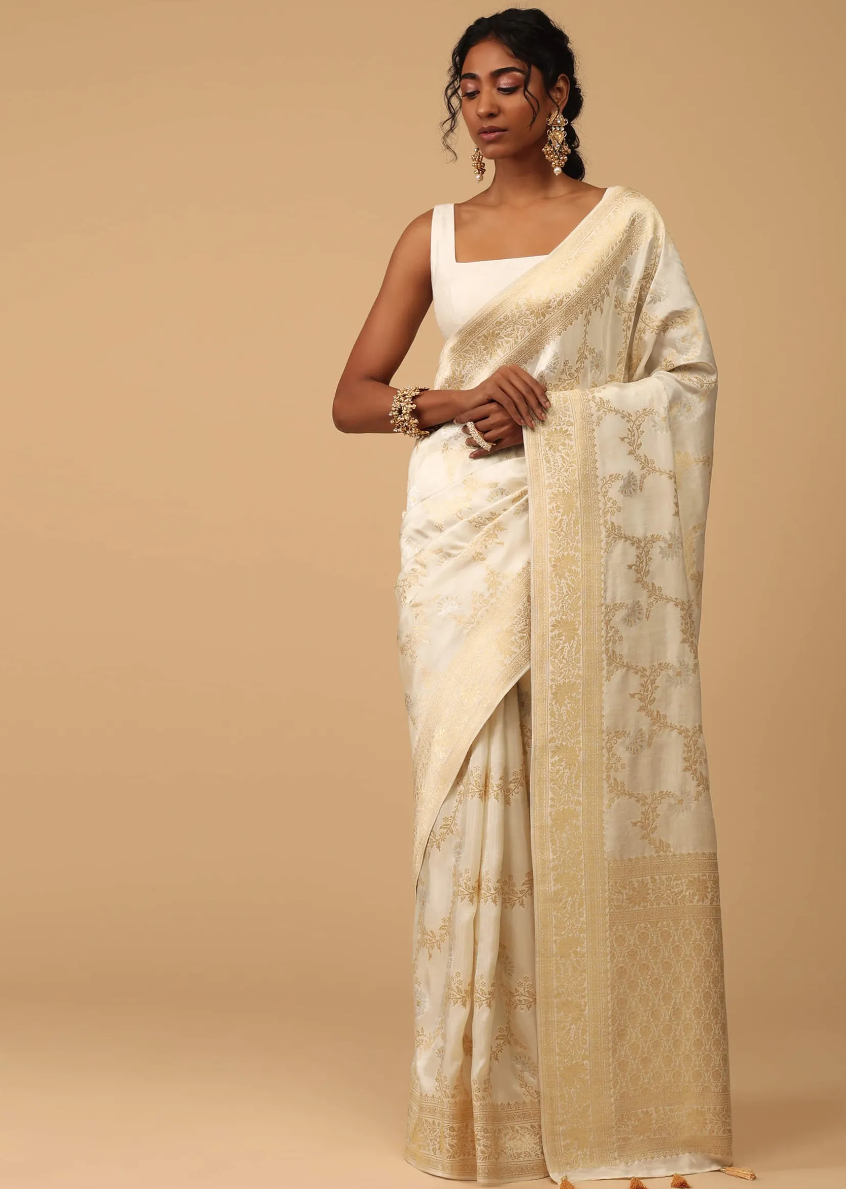 Ivory White Dola Silk Saree With Silver And Gold Jaal Embroidery In Floral Pattern