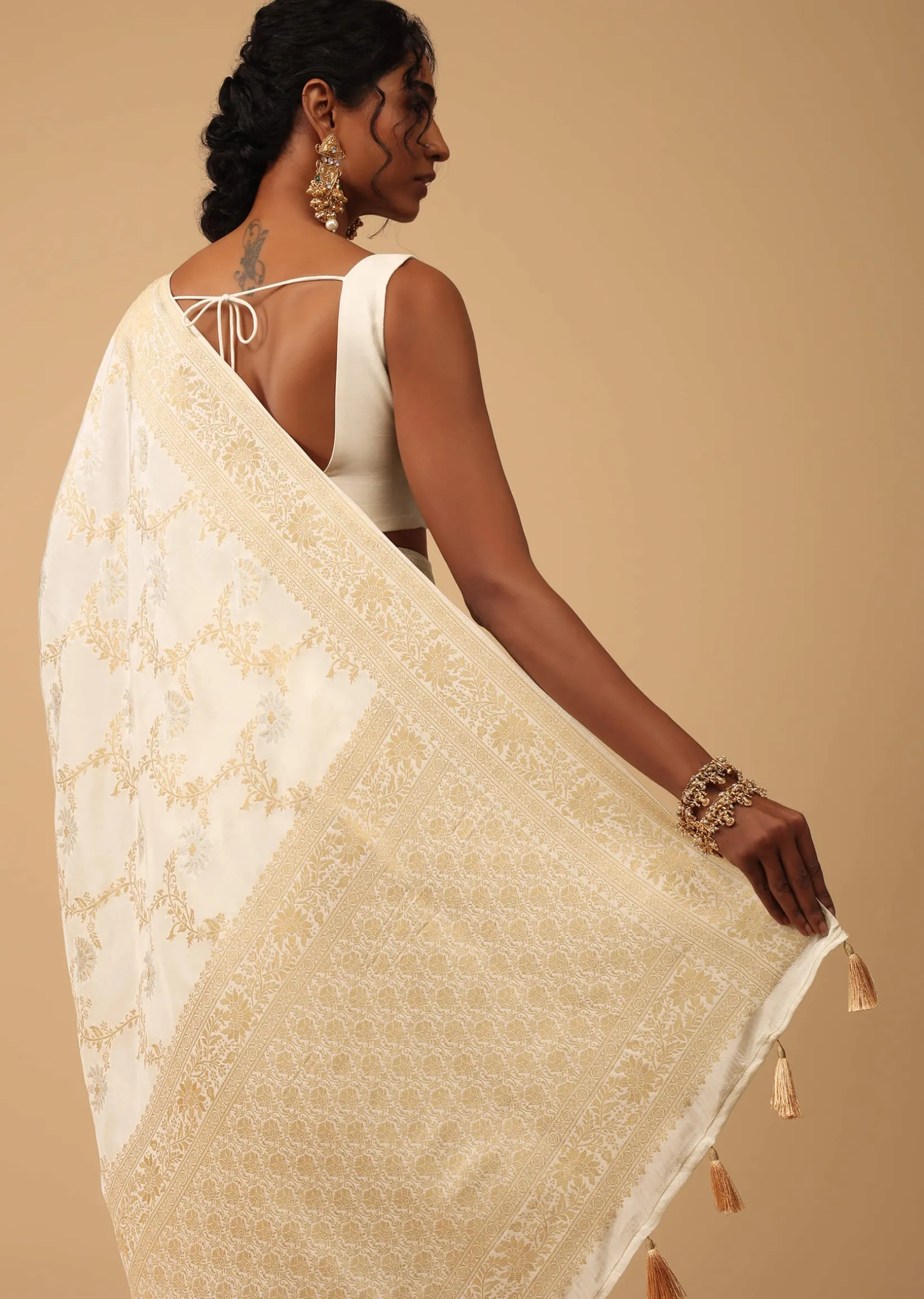 Ivory White Dola Silk Saree With Silver And Gold Jaal Embroidery In Floral Pattern