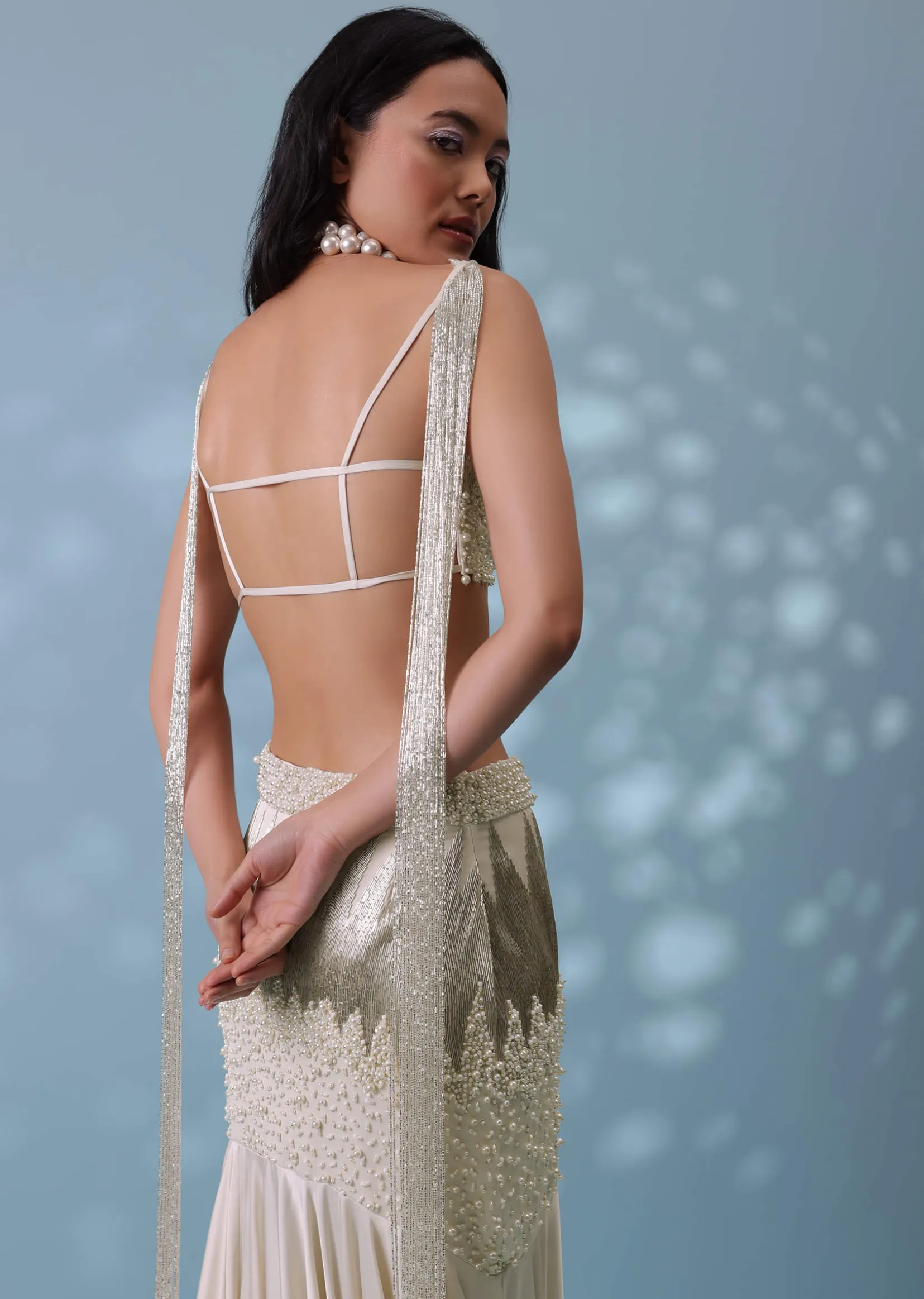 Ivory White Embroidered Trail Lehenga Set In Milano Satin With Tassel Blouse