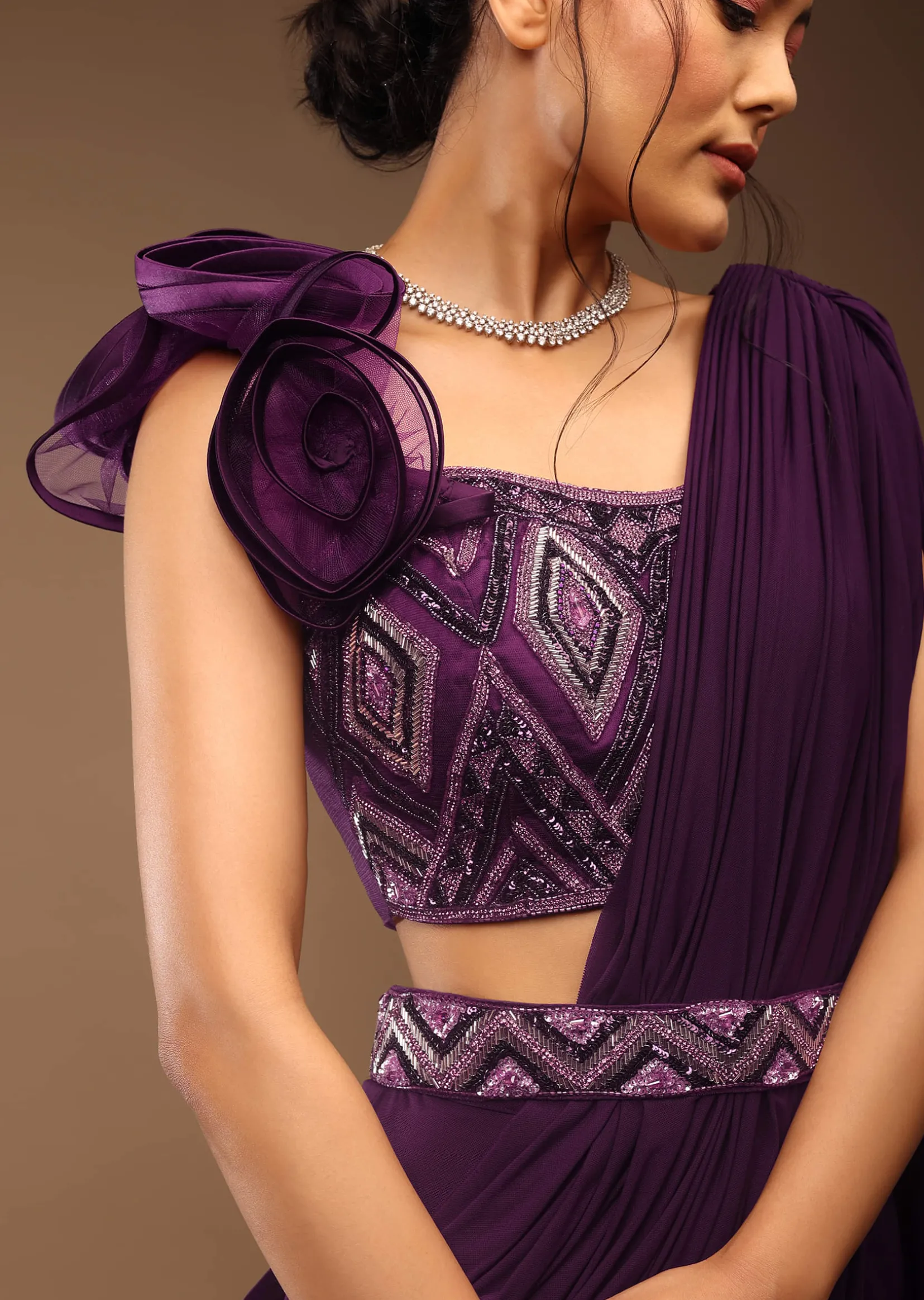 Jewel Purple Pre Stitched Saree With A 3D Flowers Crop Top In Stones And Multi-Colored Embroidery