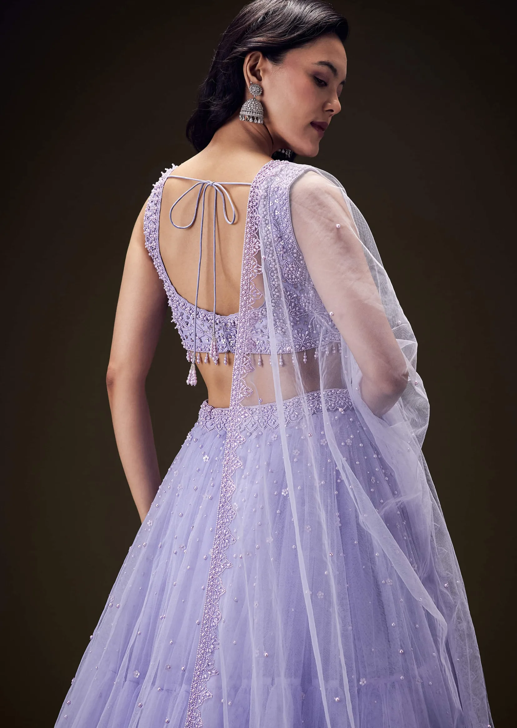 Lavender Net Hand Embroidered Pearl Work Lehenga Set