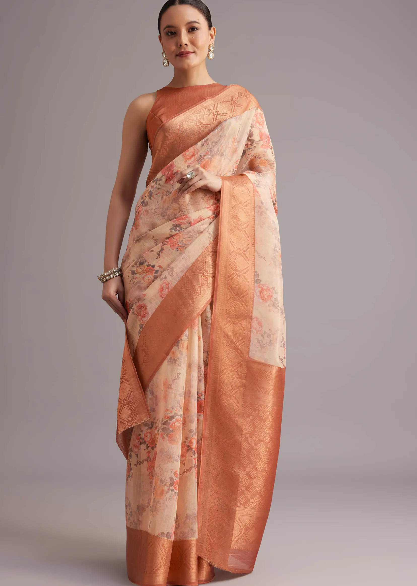 Light Yellow Tissue Silk Floral Printed Saree With Zari Woven Border