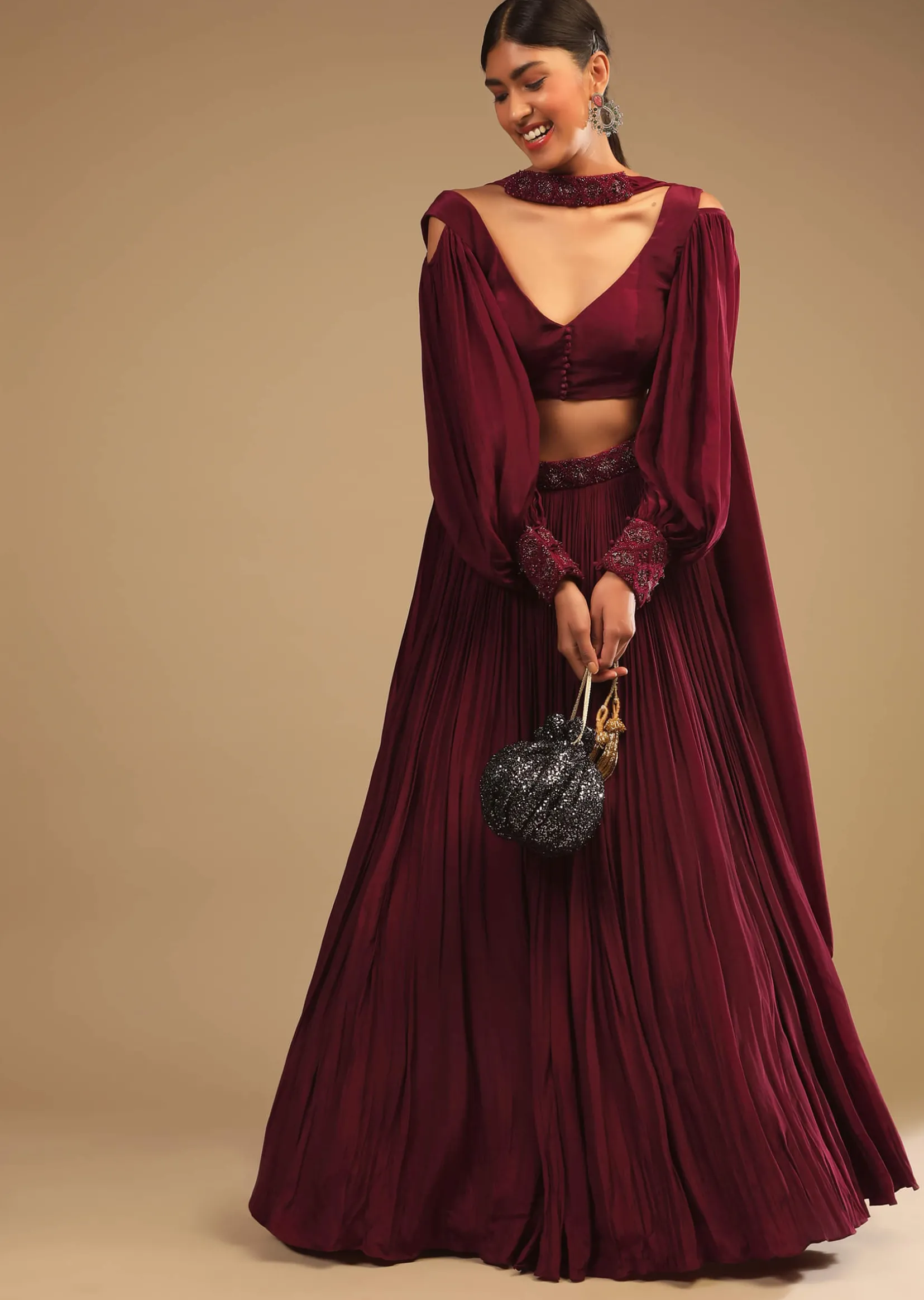 Maroon Lehenga In Crepe With Embroidery Detailing On The Waist And Bishop Sleeved Crop Top