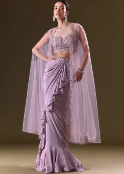 Mauve Ruffled Drape Skirt With Embroidered Blouse And Net Cape