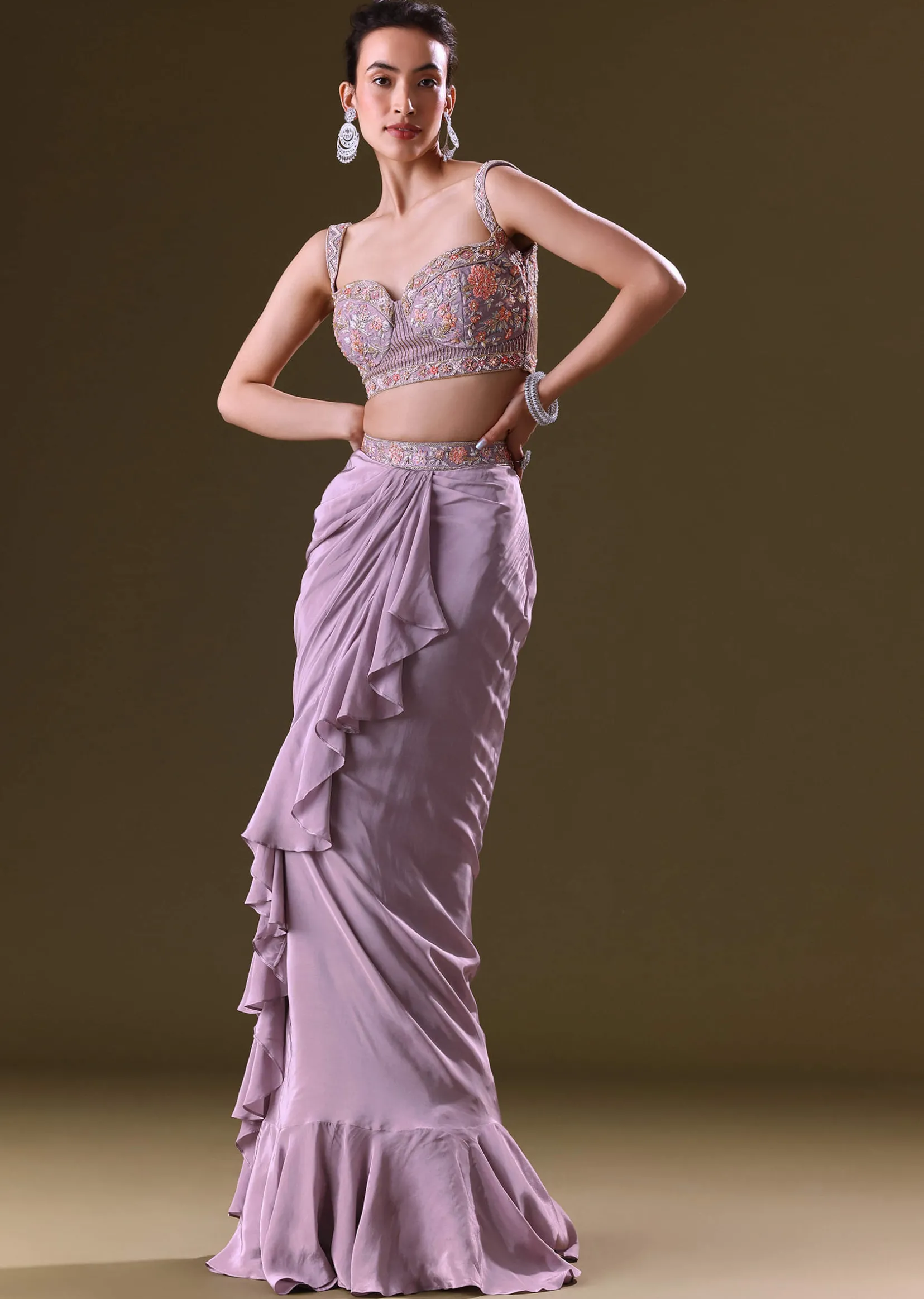 Mauve Ruffled Drape Skirt With Embroidered Blouse And Net Cape