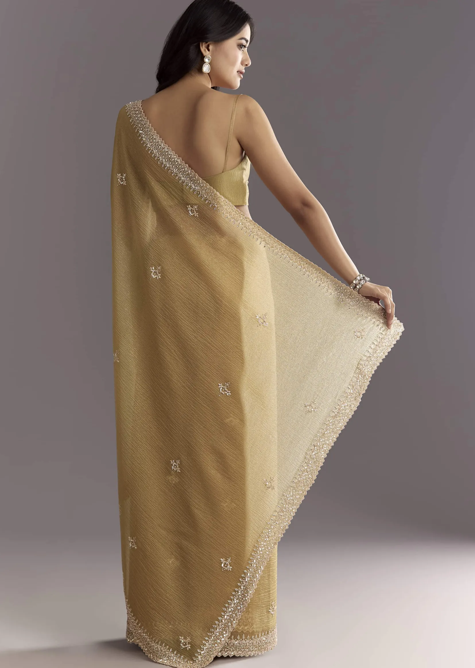 Mehendi Green Crushed Tissue Saree With Cutwork Embroidered Border