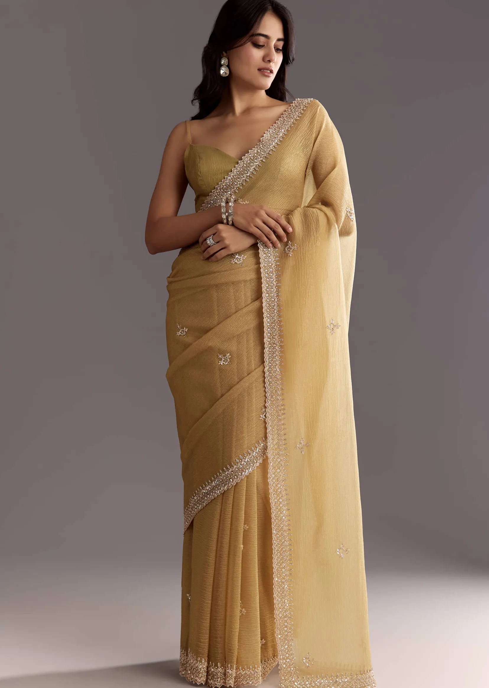 Mehendi Green Crushed Tissue Saree With Cutwork Embroidered Border