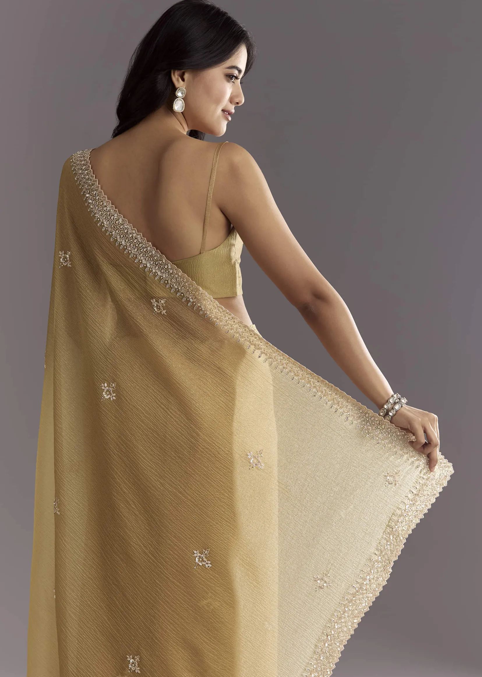 Mehendi Green Crushed Tissue Saree With Cutwork Embroidered Border