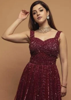 Mehreen In Kalki Burgundy Gown In Embellished Net With Fancy Cut Out Back