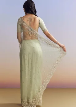 Mint Green Net Saree With Scallop Border And Heavy Embroidery