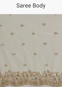 Mint Green Net Saree With Scallop Border And Heavy Embroidery
