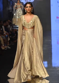 Mocha Brown Gown With A Pre-Pleated Dhoti Skirt And Royal Cape Sleeves - NOOR 2022