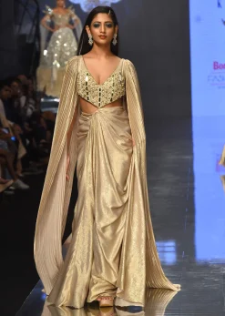 Mocha Brown Gown With A Pre-Pleated Dhoti Skirt And Royal Cape Sleeves - NOOR 2022