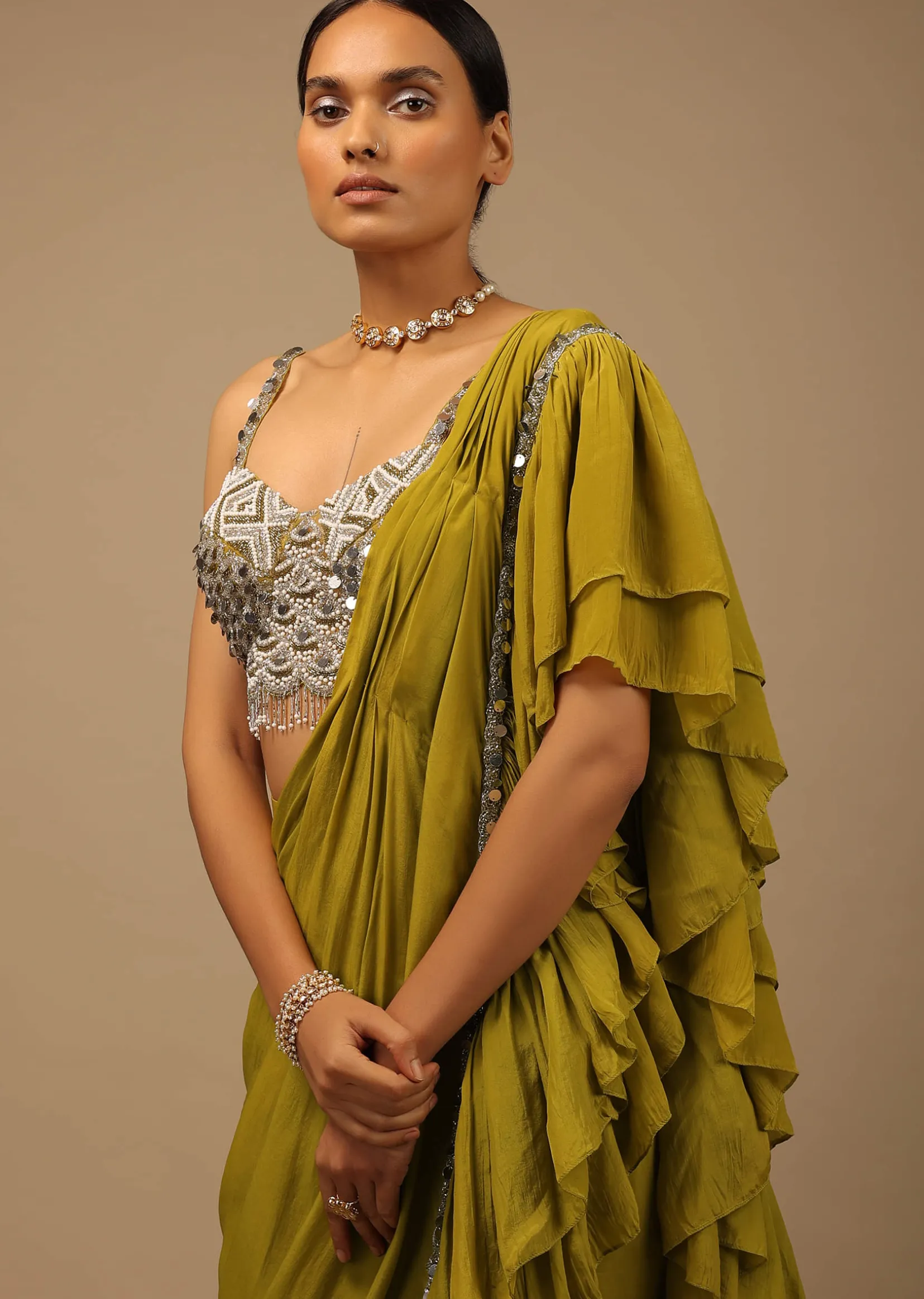 Moss Green Ready To Wear Ruffle Saree With A Heavy Sequins And Cut Dana Embroidered Crop Top
