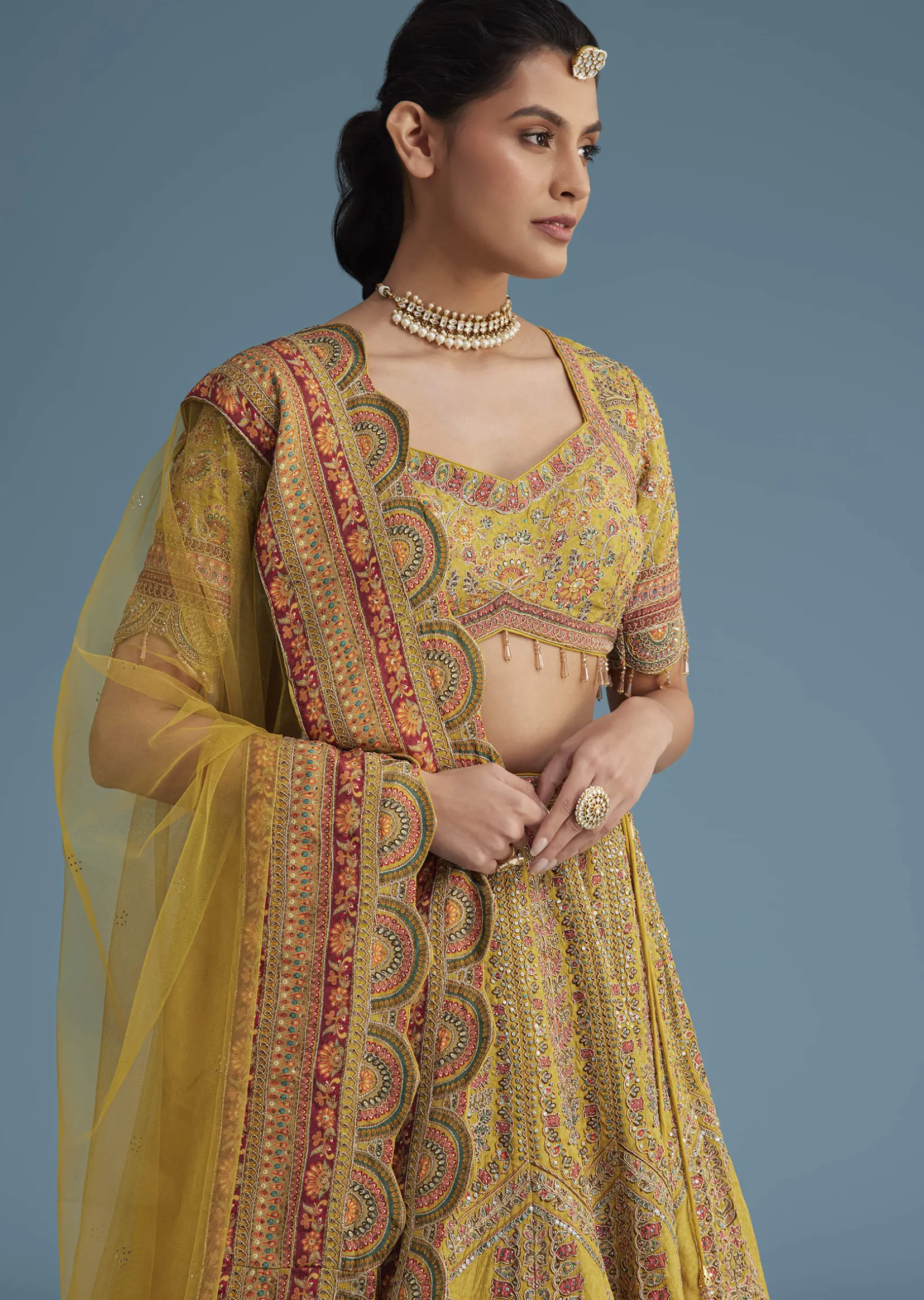 Mustard Crepe Lehenga Set With Floral Motif And Embroidery