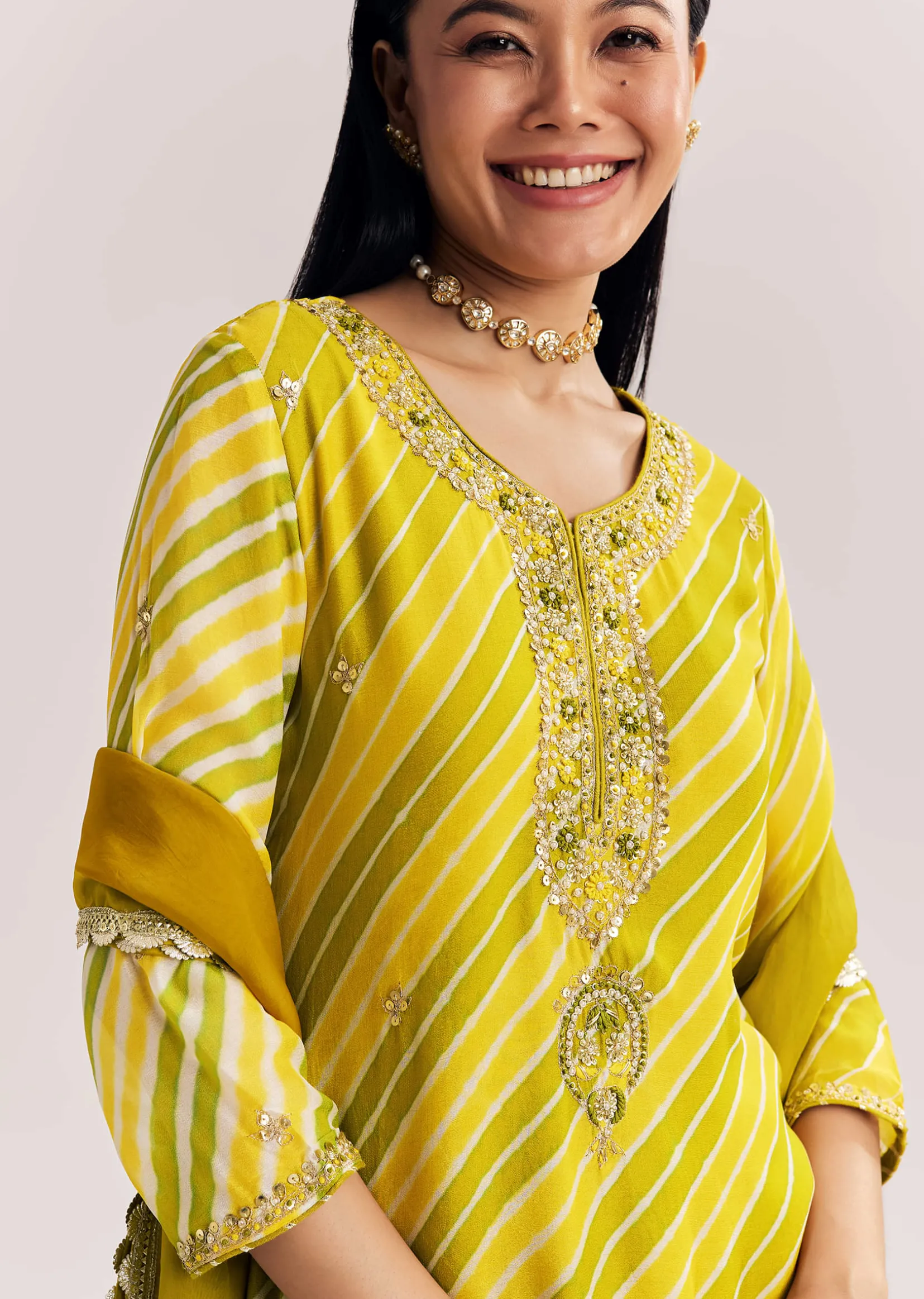 Mustard Leheriya Kurta Palazzo Suit With Cutdana And Sequins Work
