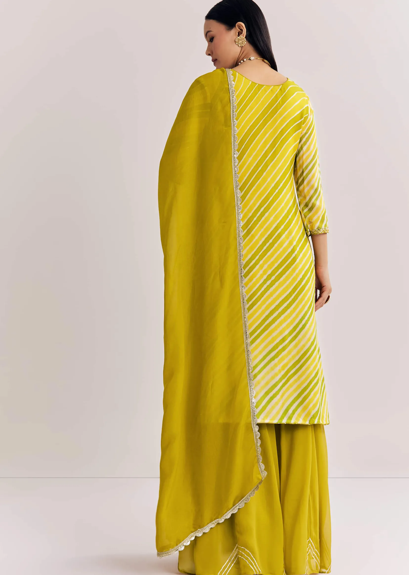 Mustard Leheriya Kurta Palazzo Suit With Cutdana And Sequins Work