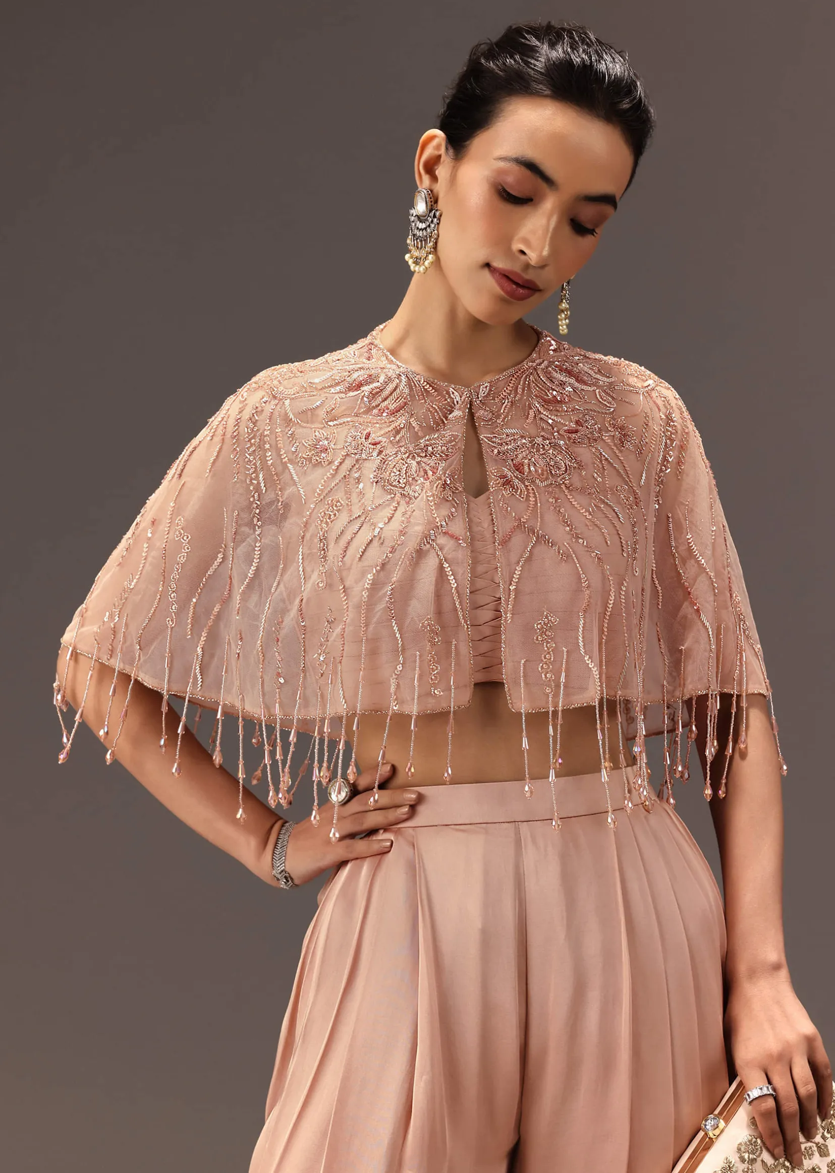 Nude Pleated Blouse With Tassel Cape And Dhoti Pants