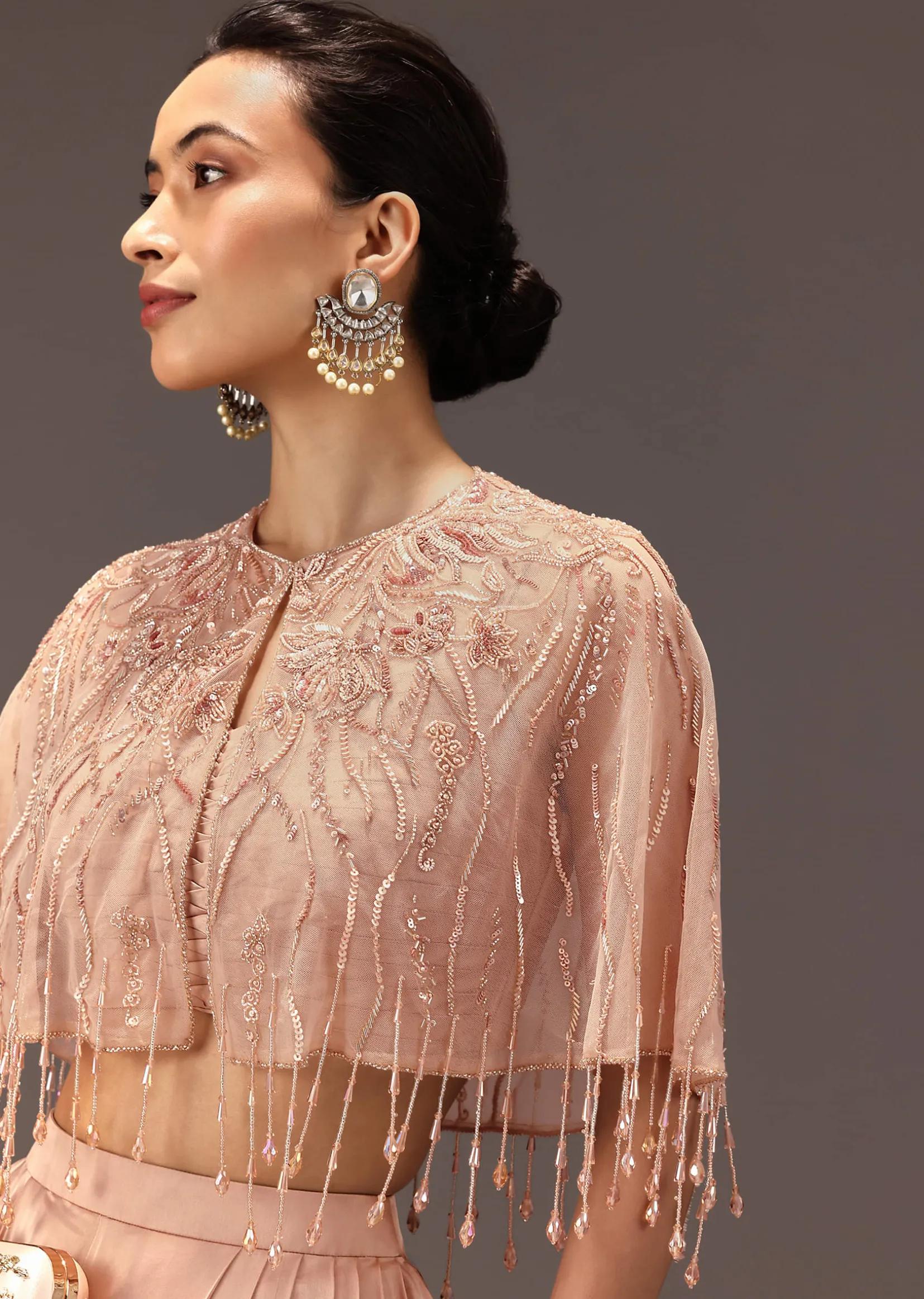 Nude Pleated Blouse With Tassel Cape And Dhoti Pants