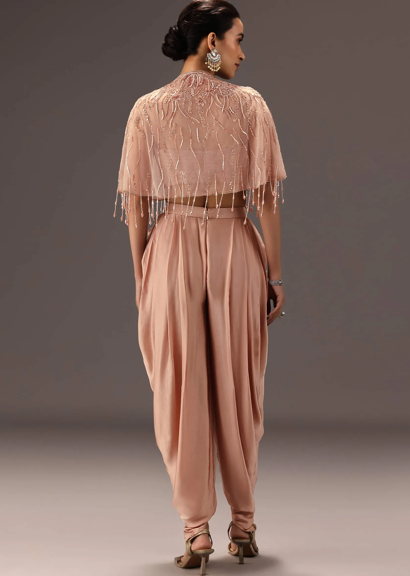 Nude Pleated Blouse With Tassel Cape And Dhoti Pants
