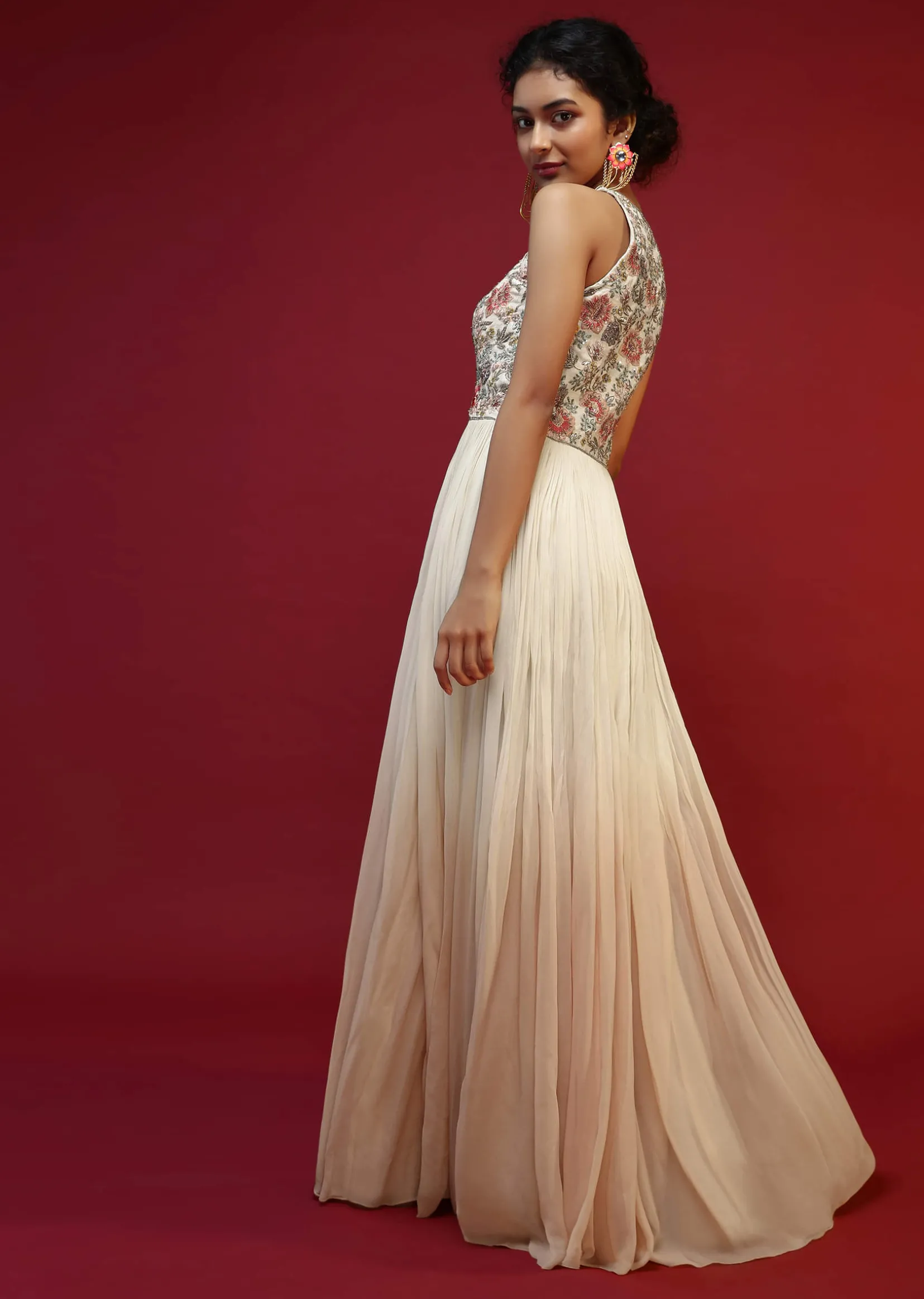 Off White Anarkali Suit With Halter Neckline And Adorned In Multicolored Hand Embroidered Floral Design On The Bodice