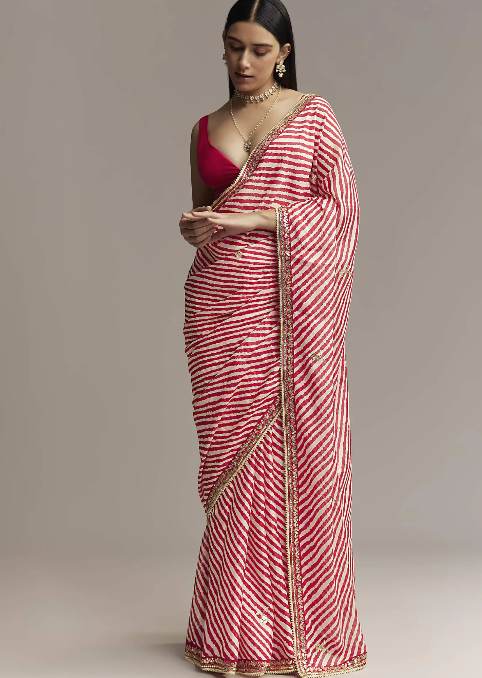 Off White And Red Striped Chinnon Saree With Gota Work