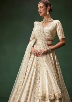 Off White Bridal Lehenga Set With Boat Neck Blouse And Regal Zari Work