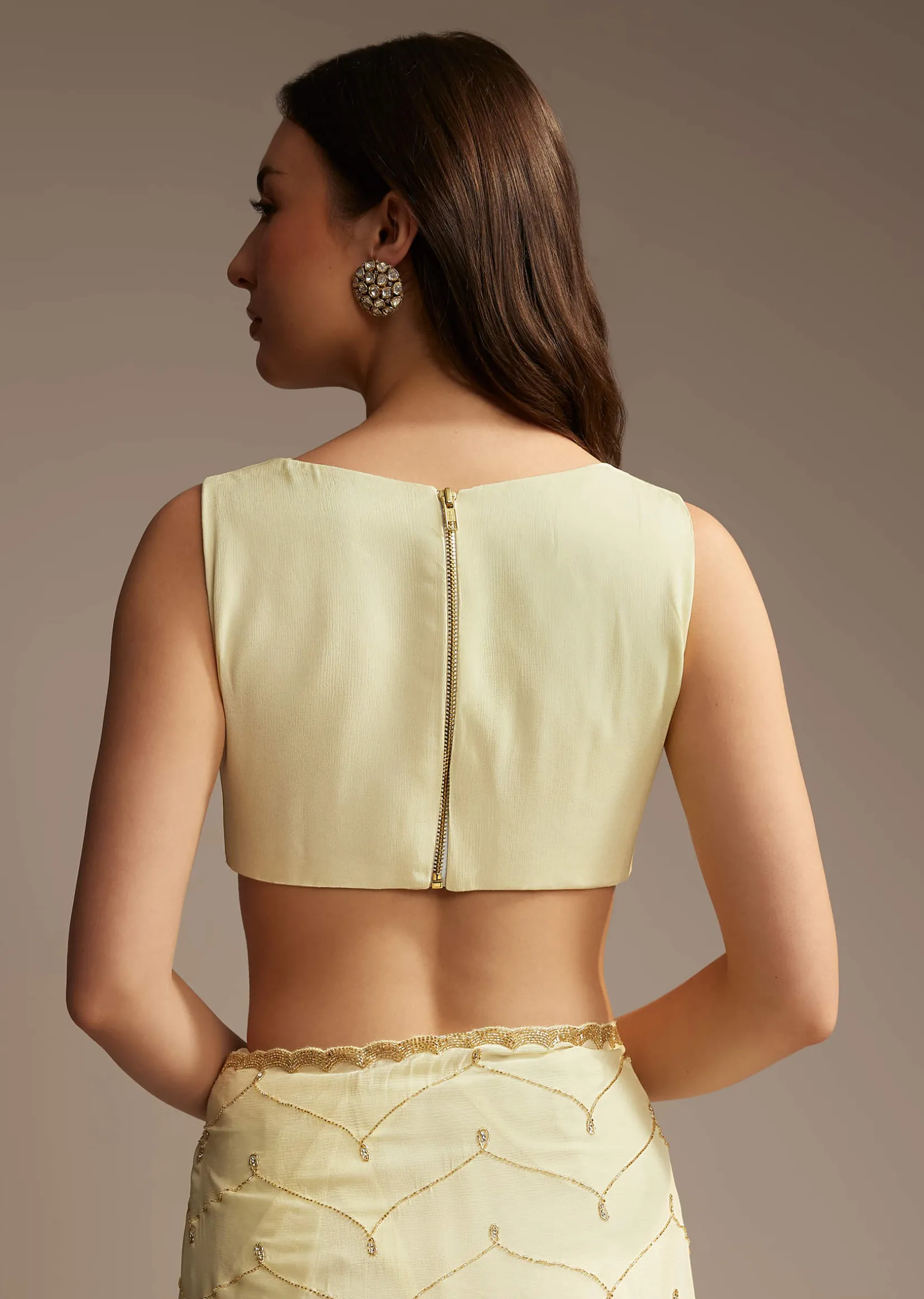 Off White Chinon Saree with Cutdana and Stone Work