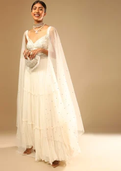 Off White Gown In Georgette With Tiered Flare And Hand Embroidered Leaf Motifs On The Bodice