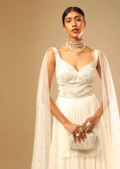 Off White Gown In Georgette With Tiered Flare And Hand Embroidered Leaf Motifs On The Bodice