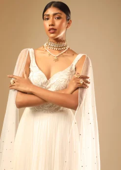 Off White Gown In Georgette With Tiered Flare And Hand Embroidered Leaf Motifs On The Bodice