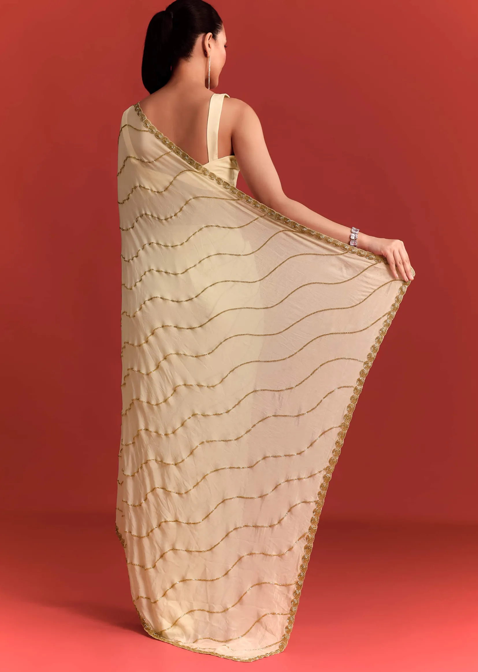 Off White Saree In Chinnon With Cutdana Embroidery