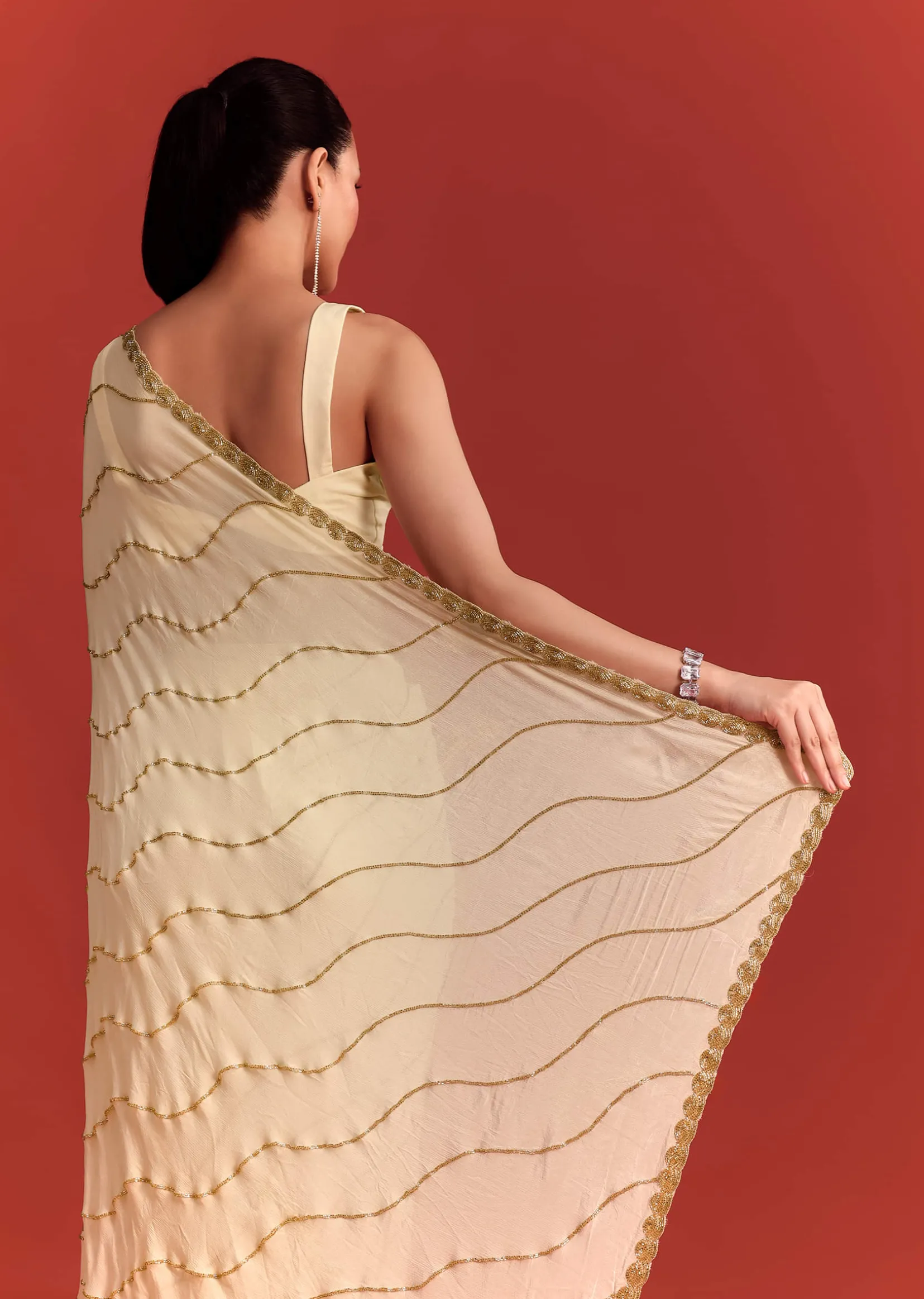Off White Saree In Chinnon With Cutdana Embroidery