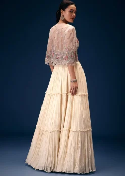 Off White Tiered Lehenga With Embroidered Corset Blouse And Embroidered Cape