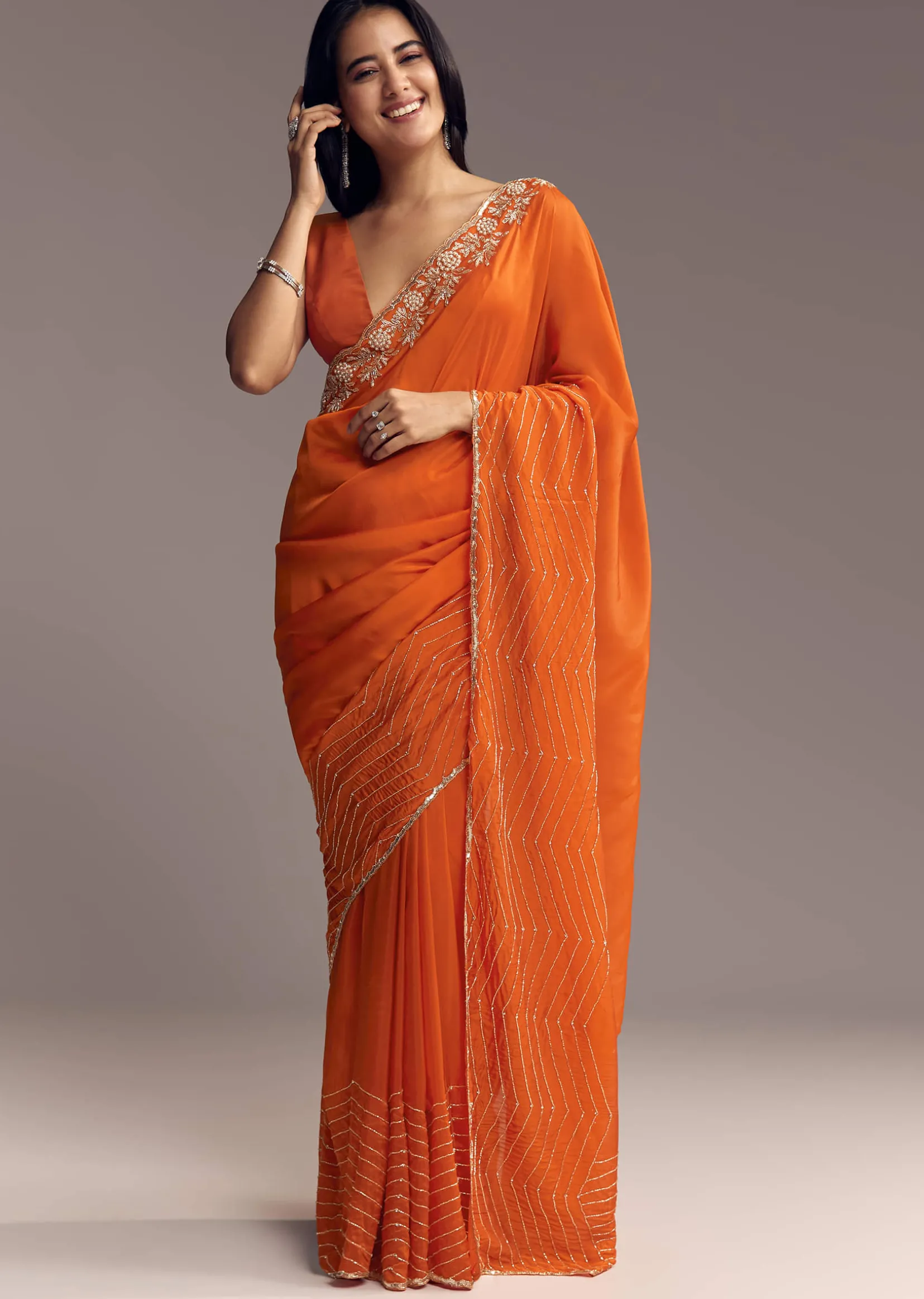 Orange Organza Saree With Zigzag Sequins And Cut Dana Embroidery