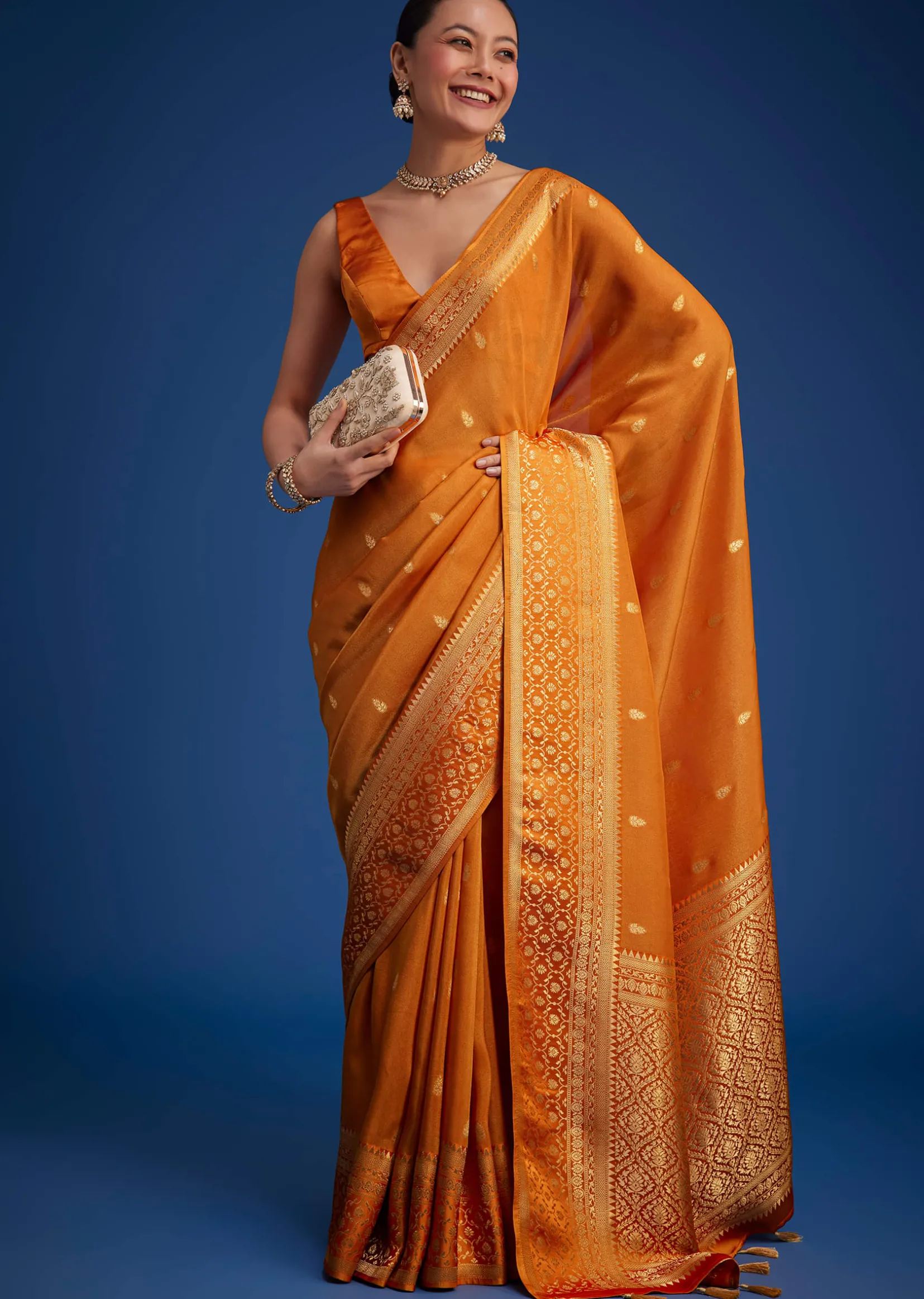 Orange Tissue Silk Saree With Zari Border And Butti Work