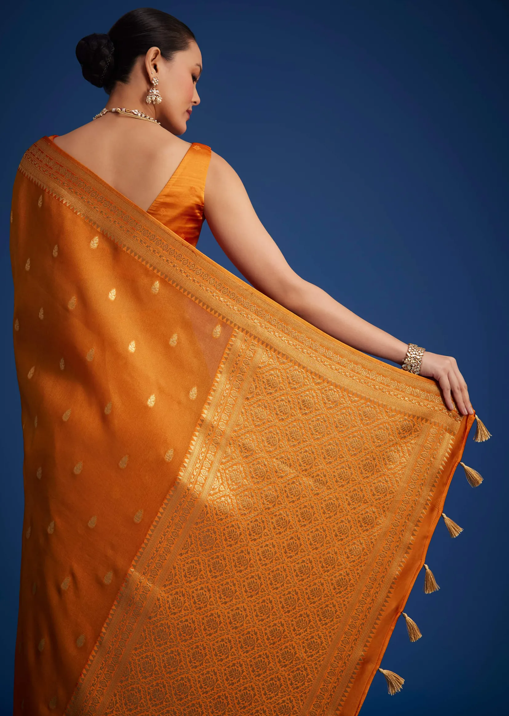 Orange Tissue Silk Saree With Zari Border And Butti Work