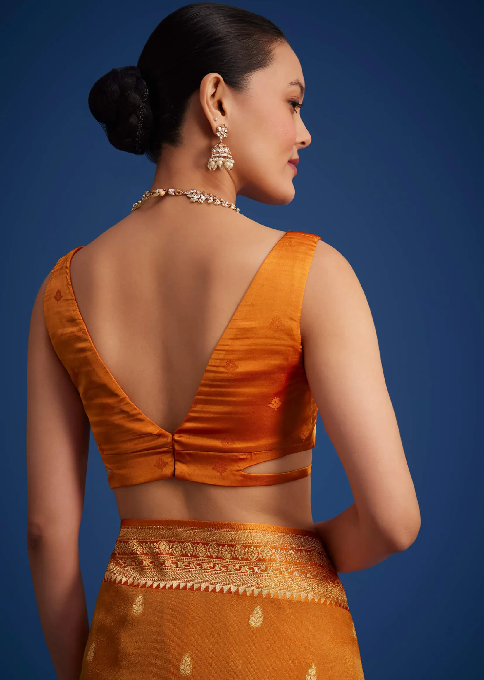 Orange Tissue Silk Saree With Zari Border And Butti Work