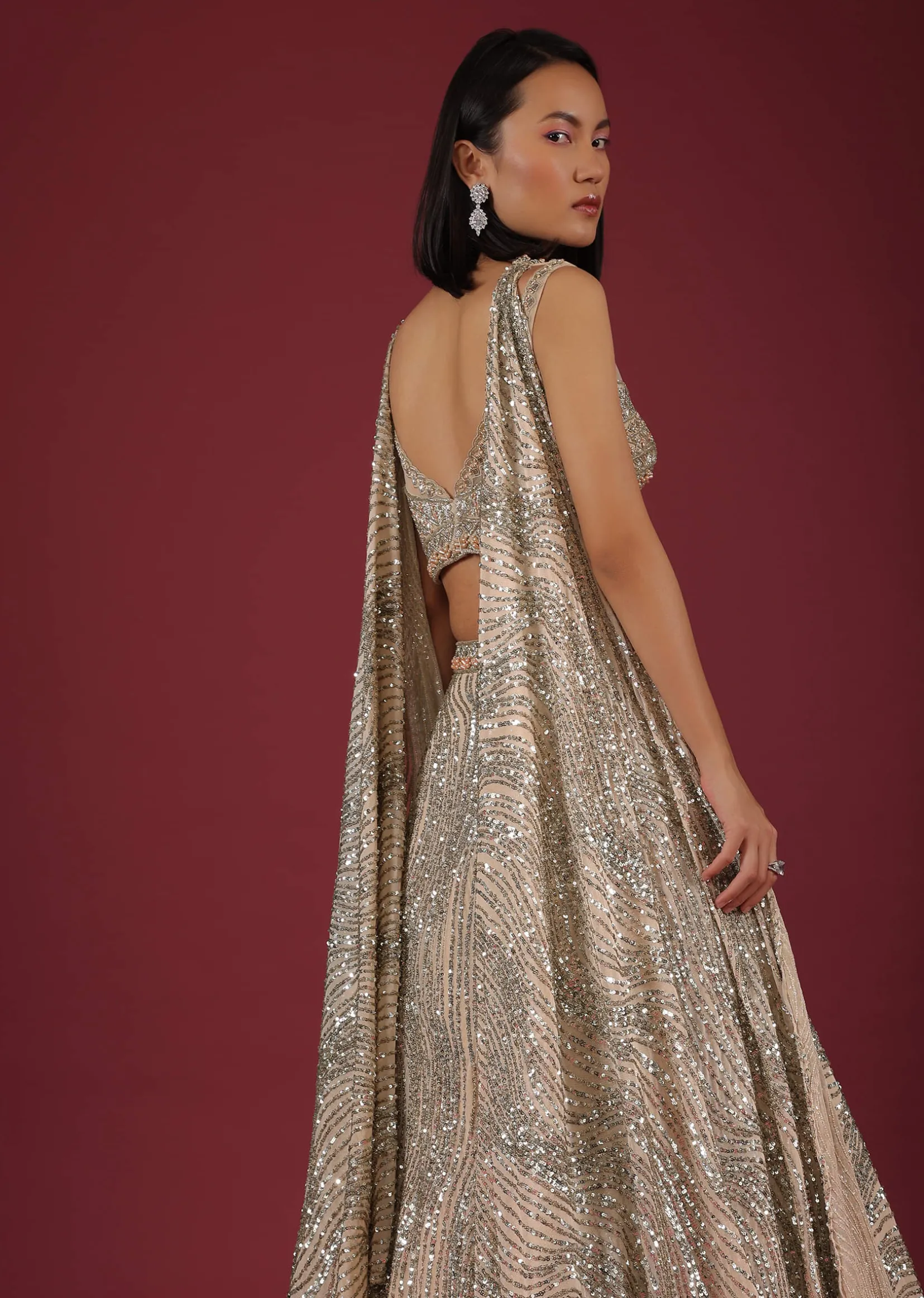 Oyster Net Lehenga And Crop Top With 3D Petal Motifs And An Open Back