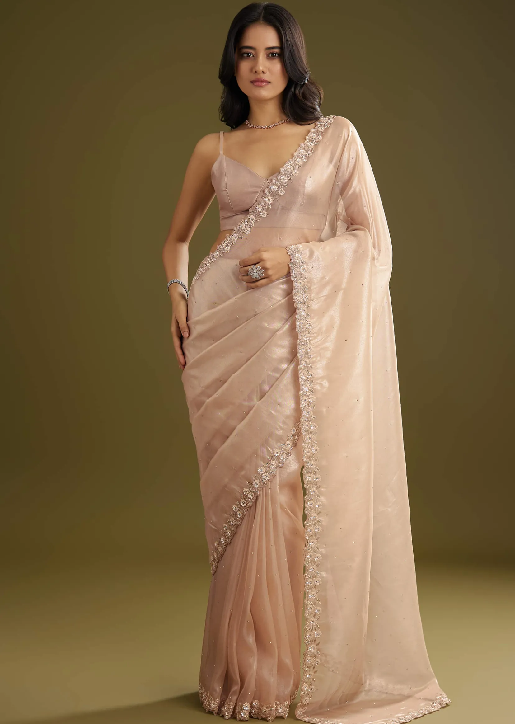 Pastel Peach Glass Tissue Stone Embellished Saree With Cutwork Border