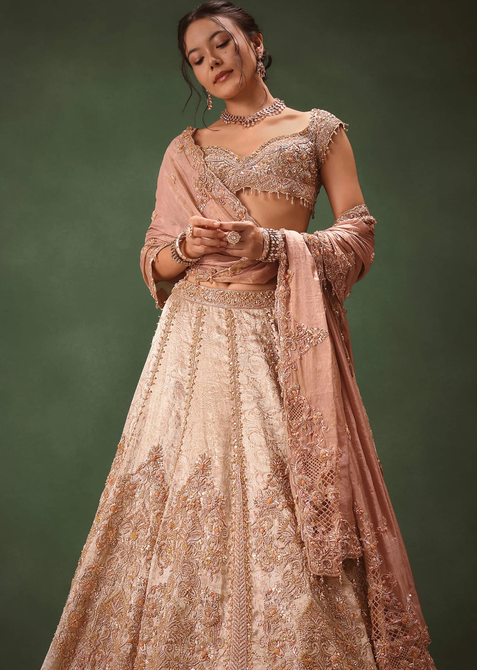 Peach Brocade Embroidered Bridal Lehenga With Two Dupattas
